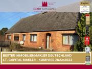 Sanierungsbedürftiges Zweifamilienhaus mit zusätzlichem...