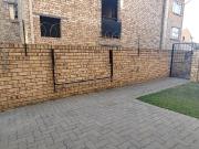 2 Bedroom, 1 Bathroom Ground floor unit with Double Carport!