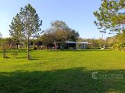 Se vende terreno con casa a remodelar