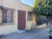 se vende terreno con construccion