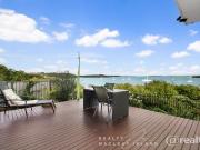 Secluded Coastal Sanctuary with Panoramic Water Views
