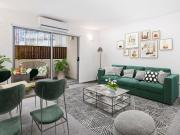 Secluded Low Rise on Tree Lined Street
