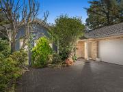 Secluded Single Level Living in a Coveted Walk to...