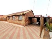 secure 3 bedroom home with carport &.