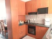 Secure Family Haven: Inviting Townhouse for Privacy and...