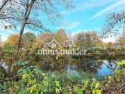 Seltenes Baugrundstück mit Wasserblick in bevorzugter...