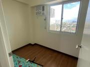 Semi furnished 2BR unit facing the amenities with...