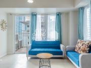 Serene High Rise Condo with Skyline Views and Comfort