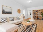 Serene updated apartment close to transport and village hub