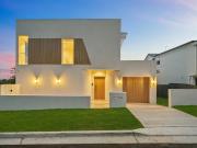 Set Across from Acacia Park is this Luxury Family Home...