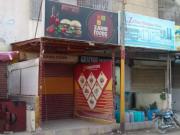 Shop with attached bath, size 11/30 road facing north...
