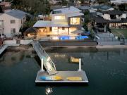 Showstopping waterfront oasis with coastal convenience