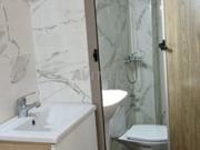 Deux appartements avec deux locaux commerciaux à vendre