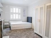 Single bed in bright twin room in Dublin