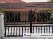 Single storey bungalow with a large flat garden