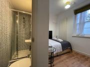 Single studio apartment located on the lower ground...