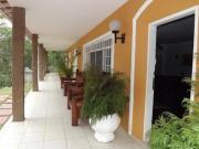 Sítio espaçoso em bairro com boa localização