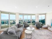 Skyline Sophistication: Renovated Landmark Apartment...