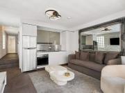 Sleek Designer Apartment in a Quiet City Setting