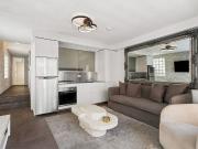 Sleek Designer Apartment in a Quiet City Setting