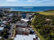 “Smart and bright style with beachside convenience”