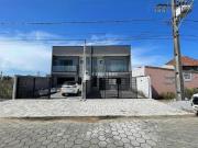 Sobrado 3 suítes quadra mar piscina praia de leste