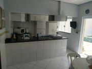 Sobrado com 3 suÃtes, sala, cozinha e quintal com piscina