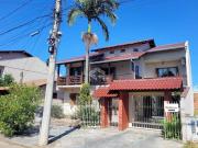 Sobrado com 4 dormitórios e 3 vagas de garagem no birro...