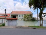 Sobrado com amplo terreno no bairro Xaxim, próximo