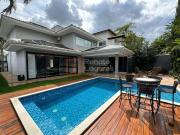 Sobrado com piscina e jardim de inverno no Condomínio...