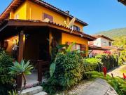 Sobrado dentro de condominio em Boilucanga