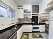 Sobrado em condomínio fechado com 5 quartos e 2 vagas de...