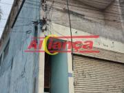 Sobrado para renda com salão comercial em Cidade...