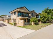 SOLD by Leigh Smith: Spacious, Easy Care Townhouse