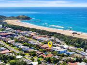 Solid as a Rock. Sweeping Ocean Views. Substantial Potential