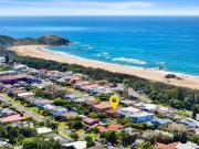 Solid as a Rock. Sweeping Ocean Views. Substantial Potential