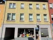 Solides Mehrfamilienhaus mit 4 Einheiten in zentraler Lage