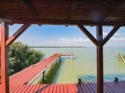 SONNENANBETER UND SEGLER AUFGEPASST FLACHDACHHÜTTE MIT...