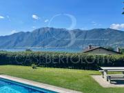 Sonnenverwöhnte Gartenwohnung mit Seesicht, Pool und...