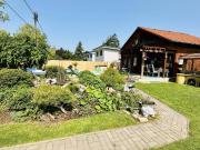 Sonnige Gartenoase mit Pool und Grillplatz