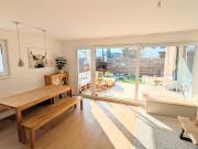 Sonnige Gartenwohnung mit Reihenhaus Charakter...