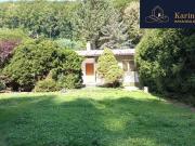 Sonniges und ebenes Baugrundstück mit Althausbestand