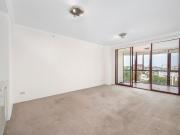 SOPHISTICATED AND MODERN APARTMENT WITH SWEEPING CITY...