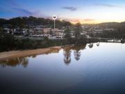 Sophisticated coastal living directly across from the sand