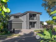 SOPHISTICATED FIVE BEDROOM METRICON STUNNER IN EXCLUSIVE...