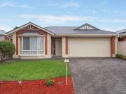 Stylish Single Level Living Between the City and the Sea