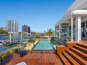 SOPHISTICATED RIVERFRONT RESIDENCE WITH SKYLINE VIEWS