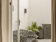 Sophisticated two bedroom flat to rent in a white stucco...
