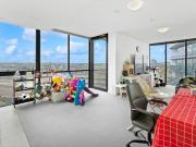 Sophisticated Waterfront Living with Panoramic City Views