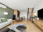 Spacious 2 Level Apartment by the Action